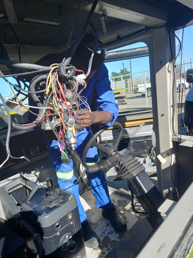 Technician repairing air-conditioning and refrigeration equipment
